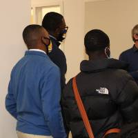 Students listening to professor